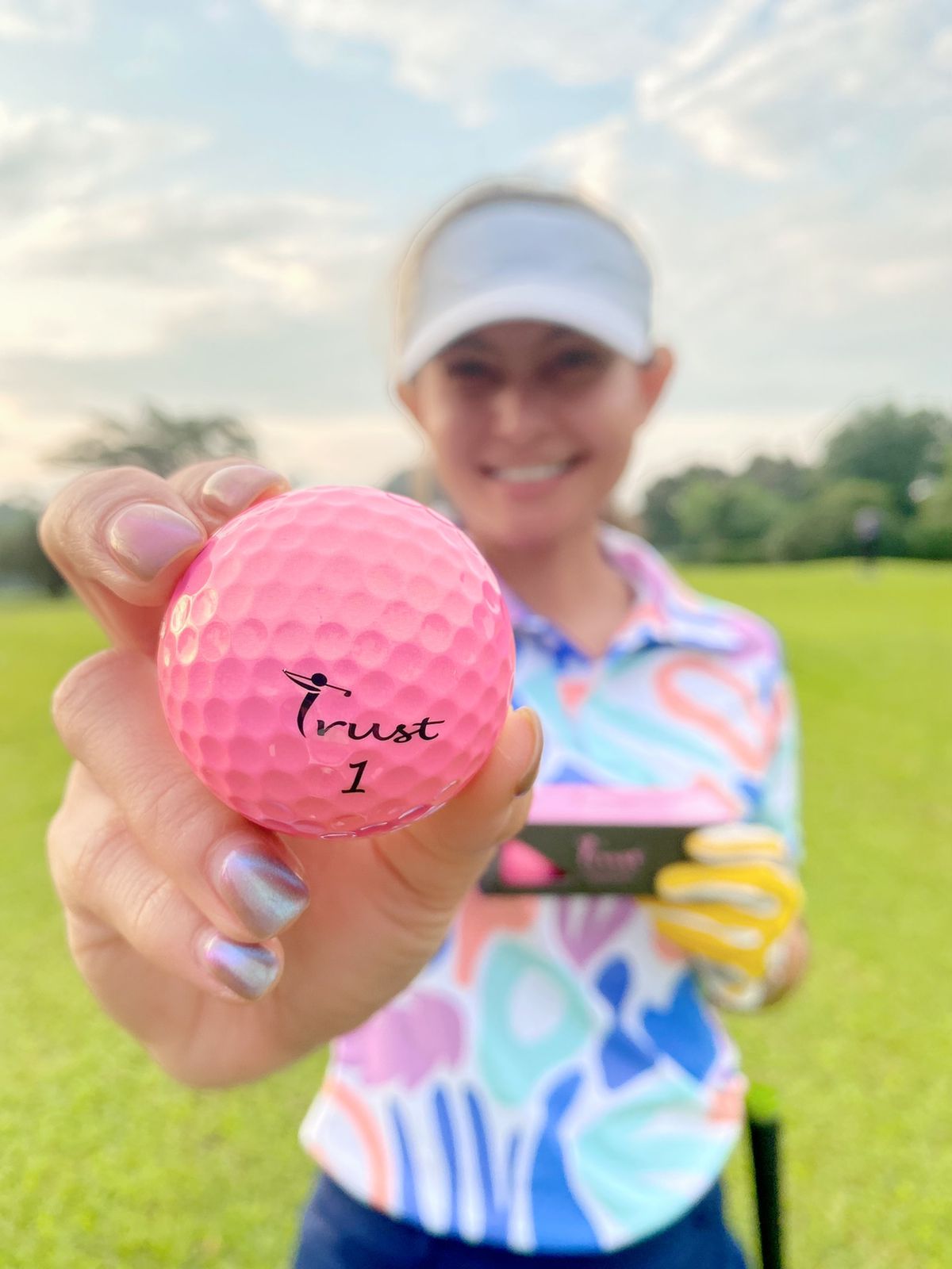 Ade Herlina with Trust Golf Rosa ball